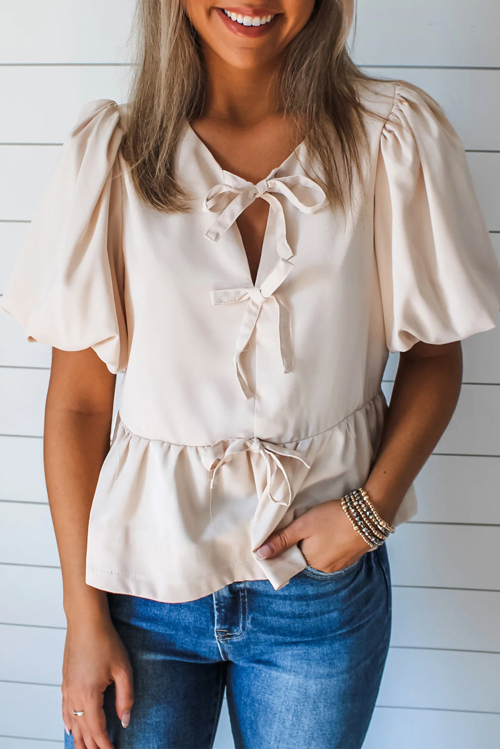 Flirty Bow Peplum Top Creamy White