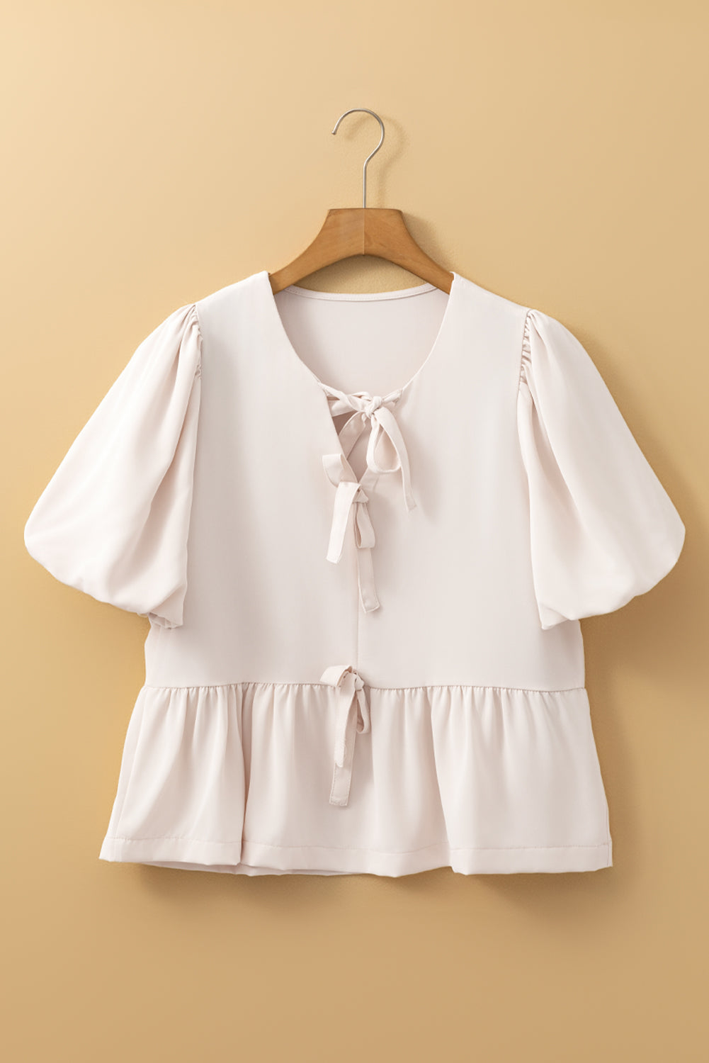 Flirty Bow Peplum Top Creamy White